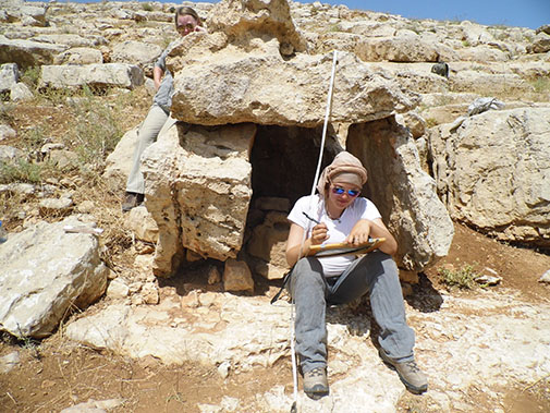 One of the survey teams documents a dolmen 